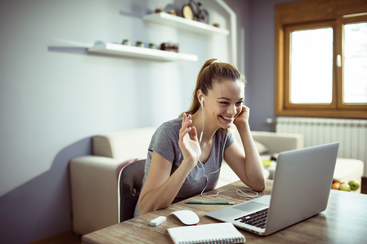 Young woman doing a video call on her laptop