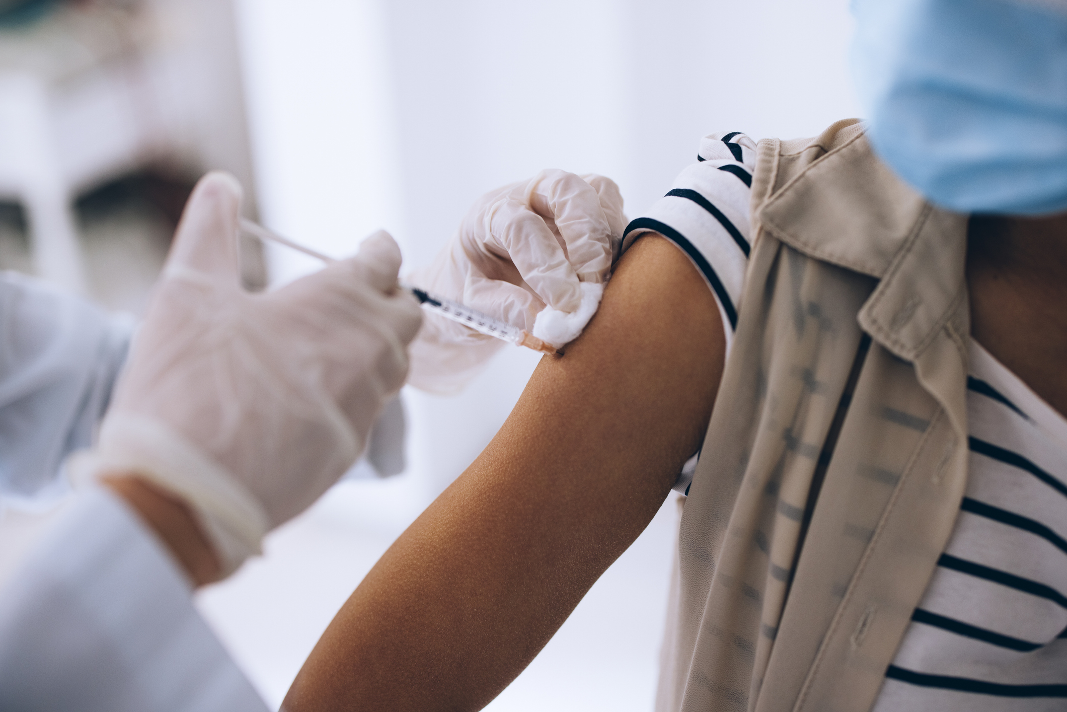 Covid-19 Prevention: Nurse Injecting a Vaccine into the Patient&rsquo;s Arm