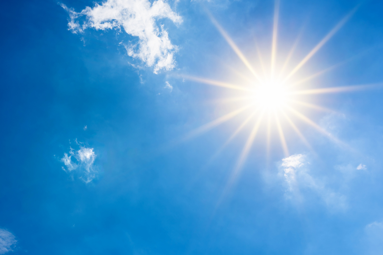 Bright sun on blue sky